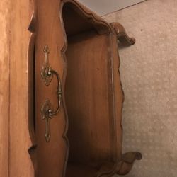 French Provincial bedroom set which includes a double bed headboard two bed stands and a dresser and mirror from Ethan Allen in the 50’s