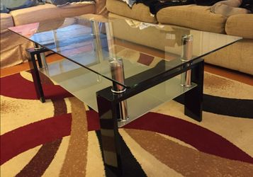 Dual level glass coffee table