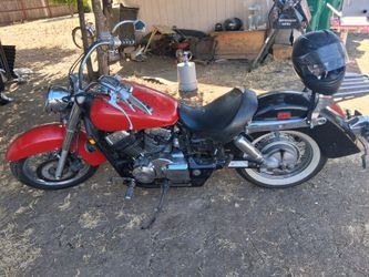Red Cruiser Motorcycle with Whitewall Tires
