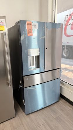 FOUR-DOOR STAINLESS STEEL GE REFRIGERATOR