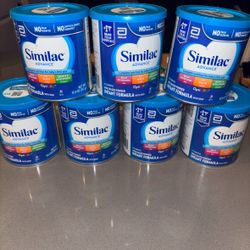 7 Unopened Cans Of Similac Advance 