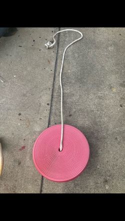 Disk swing for a playground