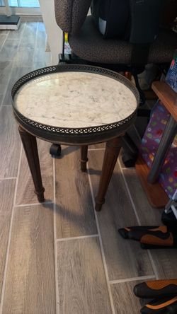 Round Marble Top Side Table with Wood legs early mid 20th century ( please google it)