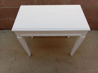 Piano bench with storage.