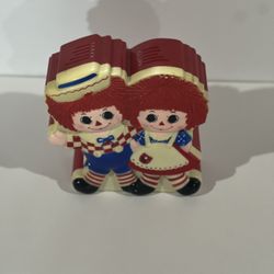 Vintage 1977 Raggedy Ann and Andy Talking Coin bank.