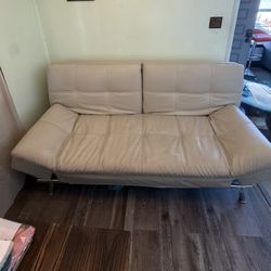 Modern Futon Sofa Bed with Built-In Power Outlets – Beige Faux Leather