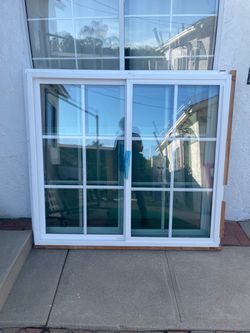 2 NEW Milgard windows 59 1/2 X 53 1/2 inches, new construction, white inside/black outside