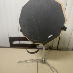 Practice Drum Pad, 12 Inches Double Sided Silent Rubber Dumb Drum with Stand . Used in good condition with some cosmetic blemishes associated with nor