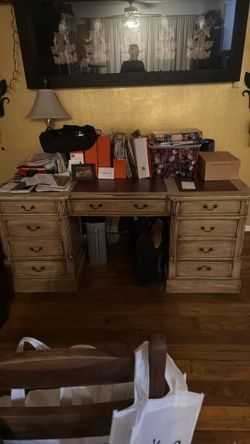 Large desk, desk openings on both sides, instead of drawers there are cabinets. Great for storage. Leather top
