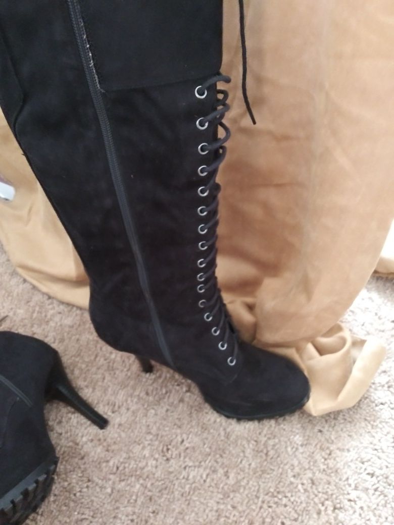 Size 8.5 very soft faux suede black lace up boots.