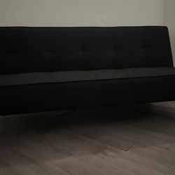 black lay out couch 