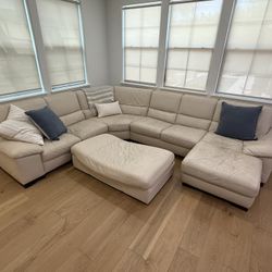Leather sectional sofa with ottoman