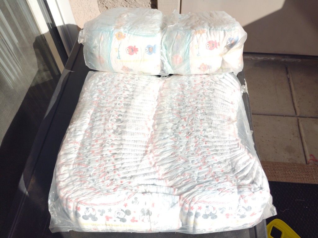 3 Sleeves Of Size 1 Diapers