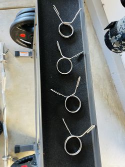 Barbell With Weights And Rack