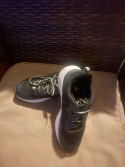 Black Low-Top Sneakers with White Sole
