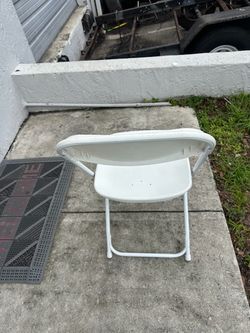 Used white folding chairs s,a,l,e
