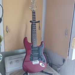 Fender squire stratocaster guitar with small amplifier