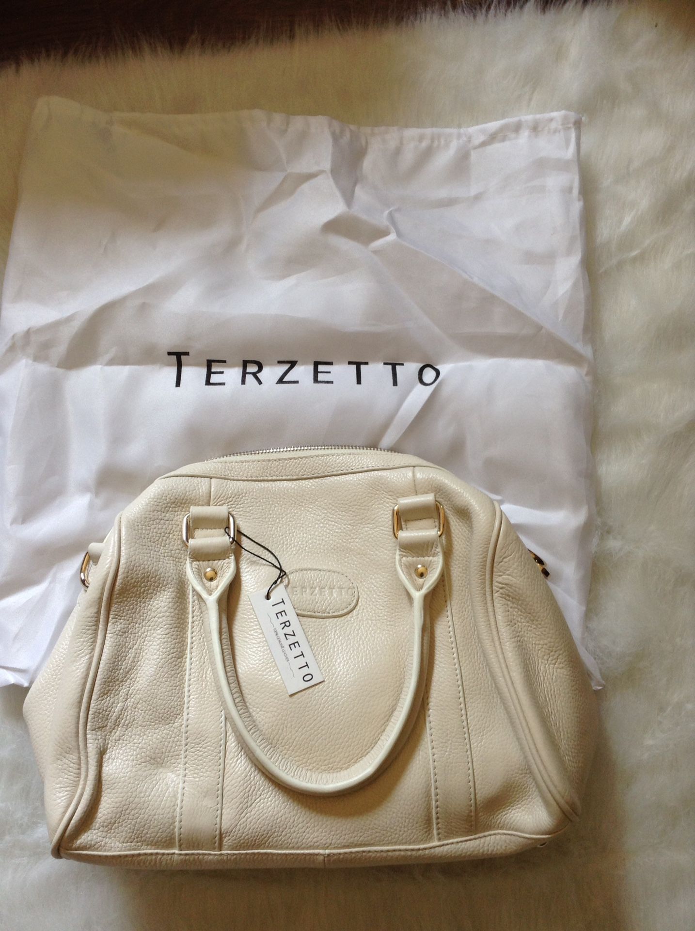 Leather Terzetto purse **brand new**