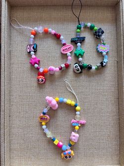 A set of Powerpuff girl phone charm
