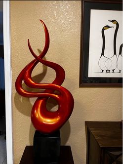 Red Sculpture With A Black Base… 41.5” Height By 20” Wide… $165