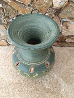 Beautiful decor floor vase, carved with flower all around.