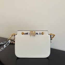 White snake-patterned organza bag

