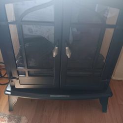 Faux Fireplace with heater $30.00 obo