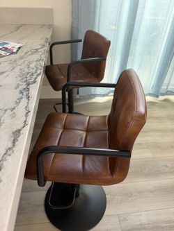 2 adjustable height swivel stools