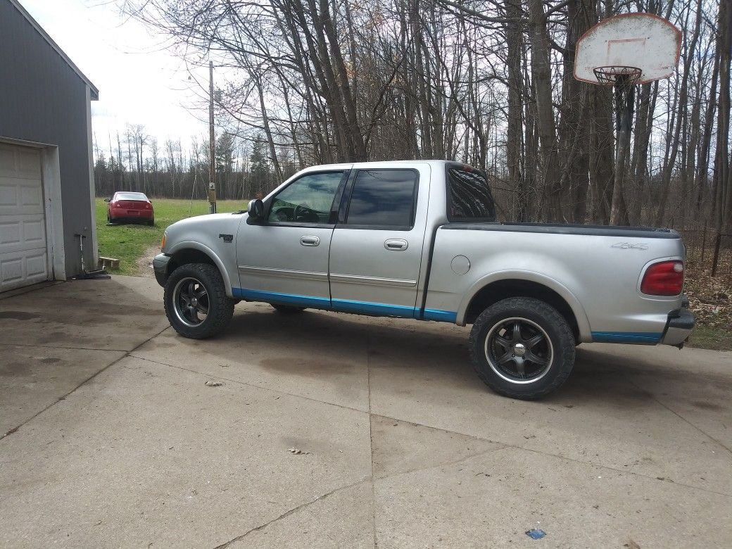 02 Ford F150 four door in great condition.