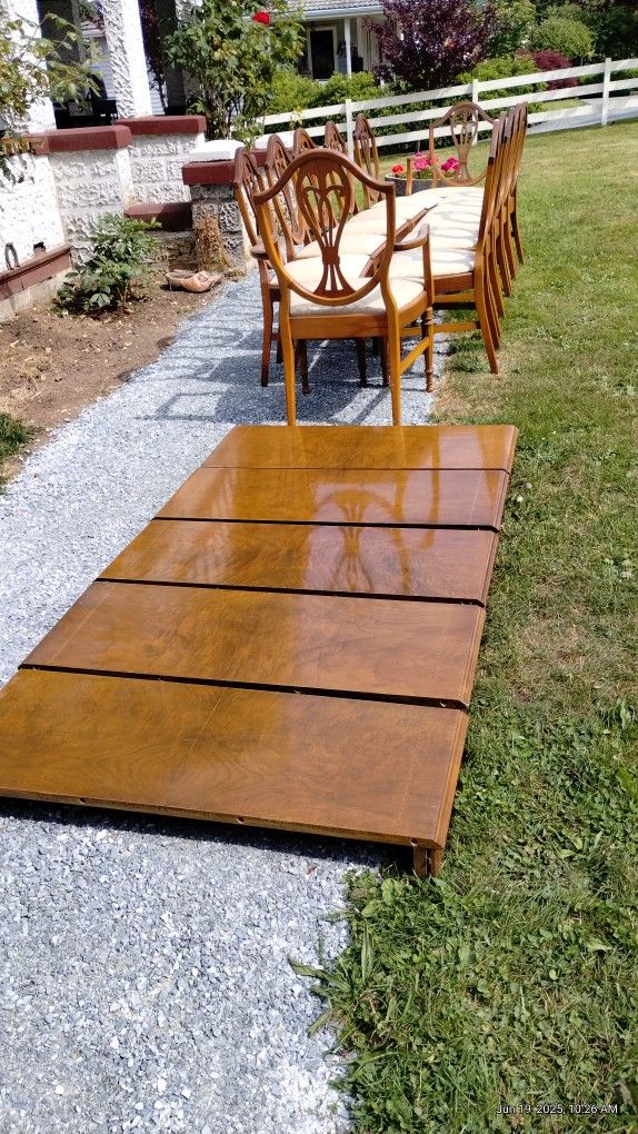 12 Chairs/5 Leafs/Free Table $210