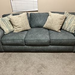 Couch , Oversized Chair And Entertainment Center