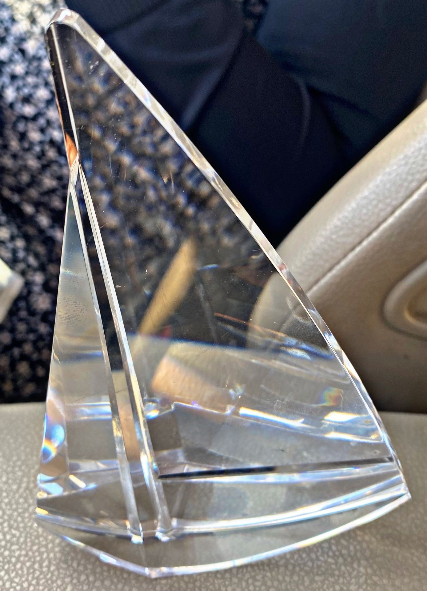 a Swarovski Crystal Sailboat figurine