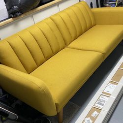 Used Novogratz 82 Inch Futon Sofa Bed in Faux Leather, Upholstered Couch Sleeper with Tufted Back, Mid-Century Modern Design, Mustard