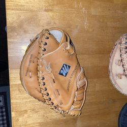 1 New And 1 used McGregor Catchers Mitts 