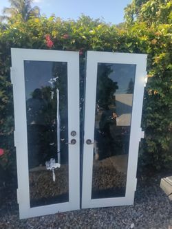 Exterior aluminum double doors hurricane impact no frame approximately 28x28x77