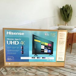 HD323 58” Hisense smart Roku 4k led Uhd tv floor model 