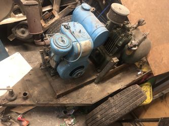 gas powered compressor on trailer.