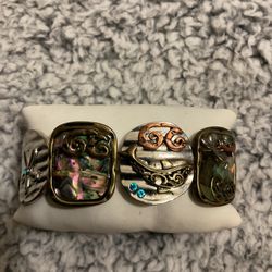 Silver And Goldtone Stretch Bracelet With Many Designs