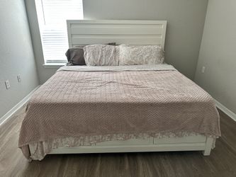 Full size quarter set with chest of drawers and two white bedside tables 