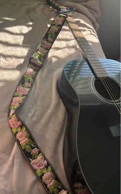 Guitar w/pick, cleaning towel, and strap