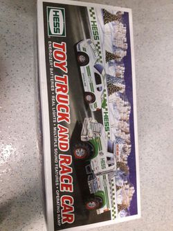 In box 2011 hess toy truck and race car