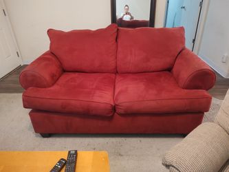Red fabric couch/loveseat