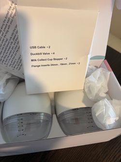 Wearable electric breast pump