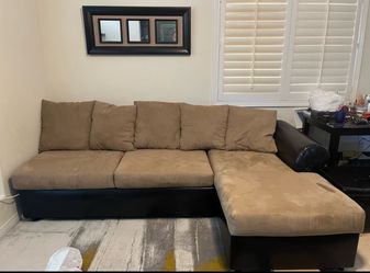Large brown sectional w/ swivel chair