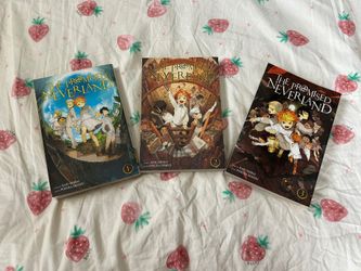 The first three of The Promised Neverland books