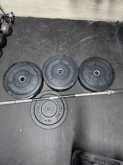 Rogue HG 2.0 Bumper Plates with barbell