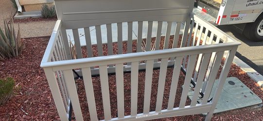 Grey crib
