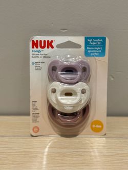 NEW 3PACK NUK PACIFIERS SILICONE ( I will say girl but can be gender neutral )