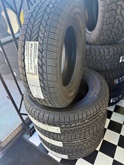 265-65-18 BRIDGESTONE WEATHER PEAK $680 CASH OUT THE DOOR Tires installed (4) New 70,000 miles