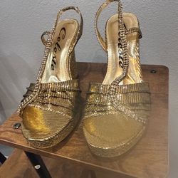 Brand new Gold glittery heels with Rhinestones